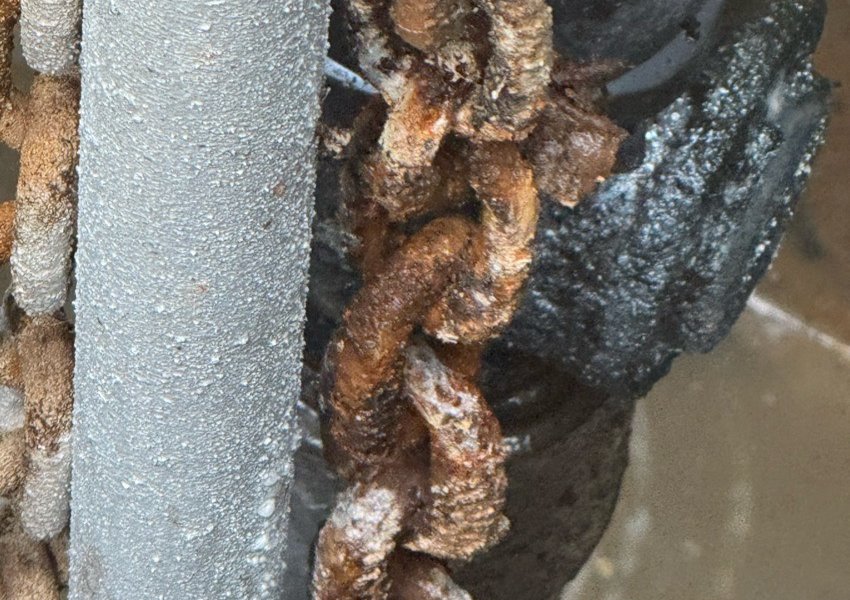 Corroded fittings inside a pump chamber in Wokingham
