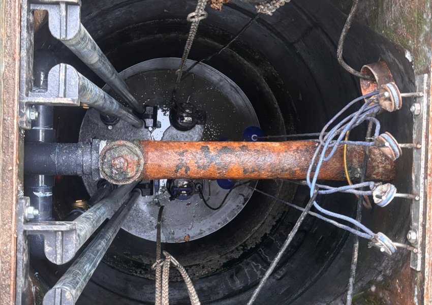 Duty and standby pumps on guide rails in a pump station, seen from above